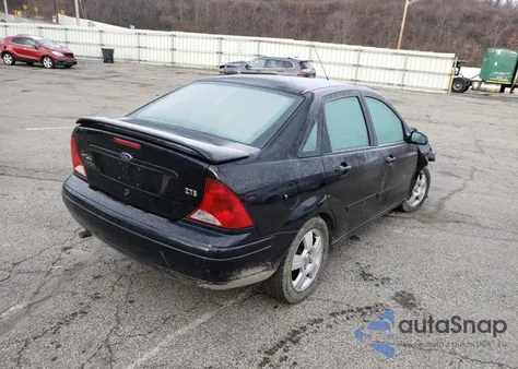 2003 Ford Focus Zts z USA, uszkodzony, nr VIN 1FAFP38343W311704